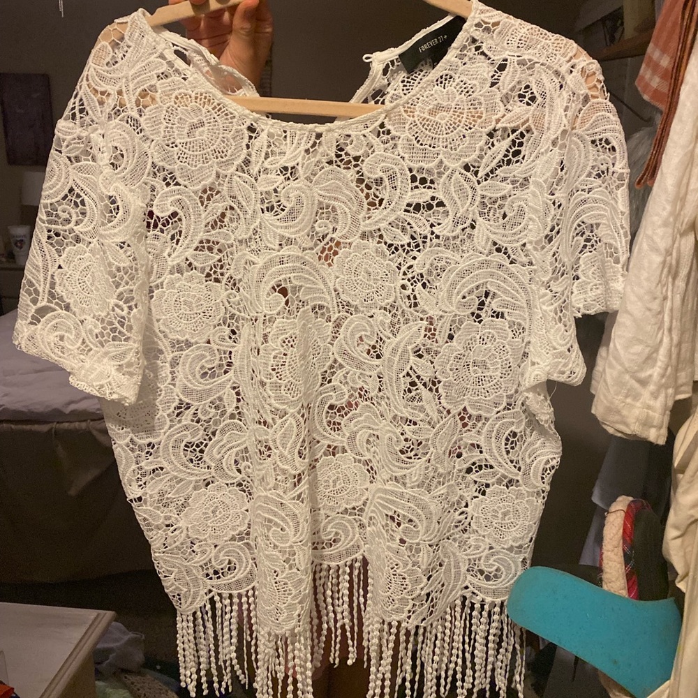 Forever 21 beautiful embroidered top with fringe at the bottom